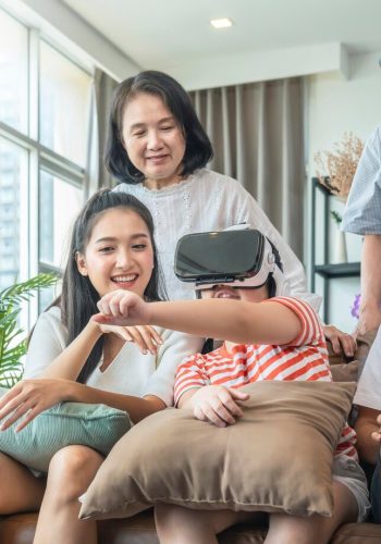 happiness-asian-family-multi-age-generation-enjoy-watch-cheering-her-daughter-up-playing-vr-goggle-together-with-fun-exited-living-room-home-interior-background-quarantine-weekend_609648-1983